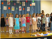 Zpívání a vernisáž dětí z 1.D a 1.E